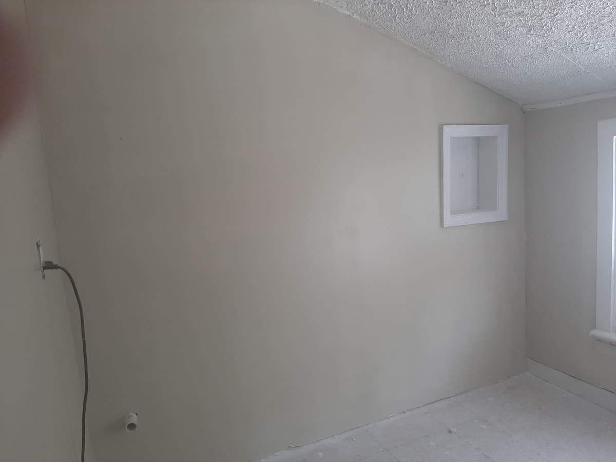 Adjoined Wall Soundproofing & Door Removal — After